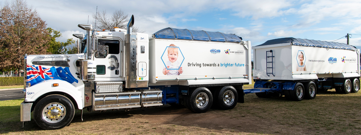 A full-length shot of the collaboration truck; it features Eli Northey on the first trailer and Sammy Colakidis on the second trailer.