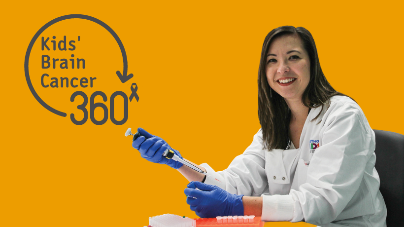 Dr Raelene Endersby wears a white lab coat and blue disposable gloves while using lab equipment; she is in front of an orange backdrop and on the left is the 