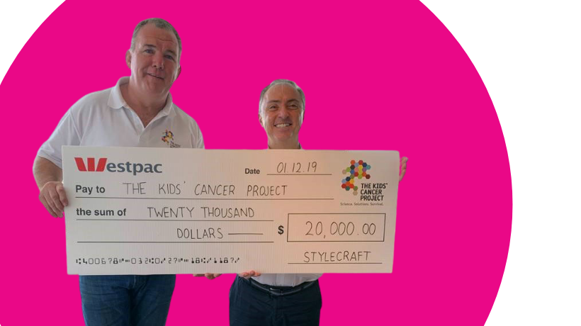 Two men holding a giant cheque