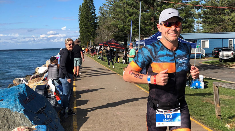 Mark Pacey running in an Ironman competition