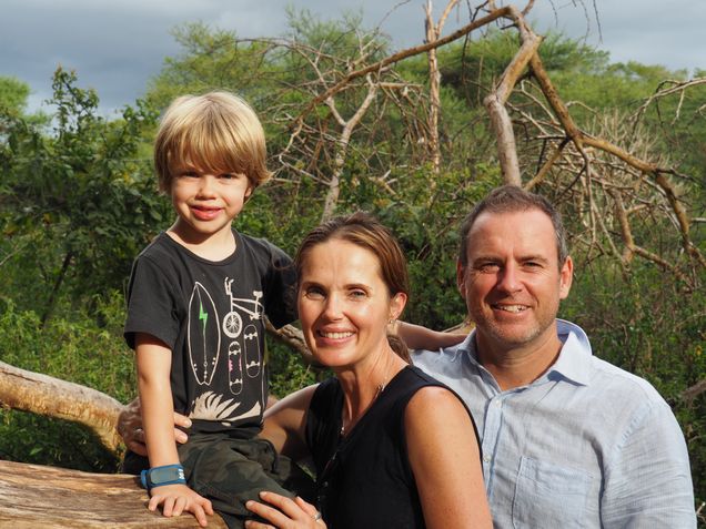 Murray poses with his parents on a family trip to Kenya.